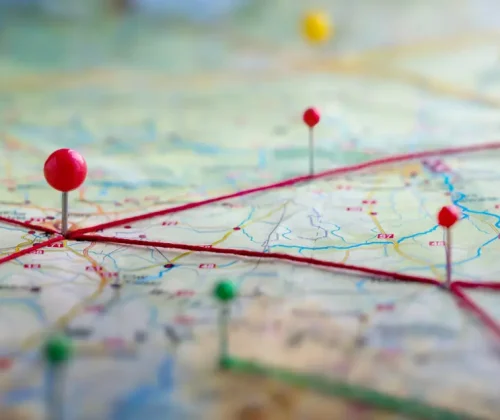 Find your way. Location marking with a pin on a map with routes. Adventure, discovery, navigation, communication, logistics, geography, transport and travel theme concept background.